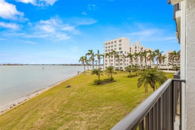 Live the Florida dream in your new move-in ready corner unit on Isla Del Sol Yacht and Country Club in Florida - for sale on GolfHomes.com, golf home, golf lot