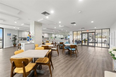 Live the Florida dream in your new move-in ready corner unit on Isla Del Sol Yacht and Country Club in Florida - for sale on GolfHomes.com, golf home, golf lot