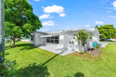 Edgewood Model- Featuring 2 spacious bedrooms, 2 modern on Leisureville Community Golf Course in Florida - for sale on GolfHomes.com, golf home, golf lot