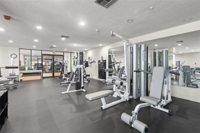 Live the Florida dream in your new move-in ready corner unit on Isla Del Sol Yacht and Country Club in Florida - for sale on GolfHomes.com, golf home, golf lot