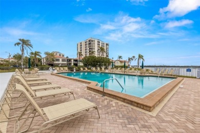 Live the Florida dream in your new move-in ready corner unit on Isla Del Sol Yacht and Country Club in Florida - for sale on GolfHomes.com, golf home, golf lot