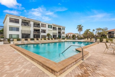 Live the Florida dream in your new move-in ready corner unit on Isla Del Sol Yacht and Country Club in Florida - for sale on GolfHomes.com, golf home, golf lot