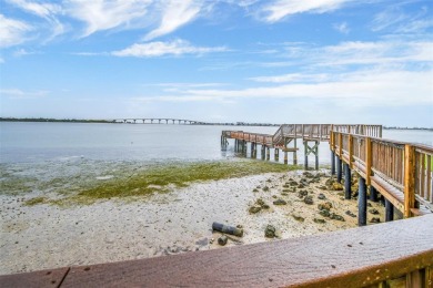 Live the Florida dream in your new move-in ready corner unit on Isla Del Sol Yacht and Country Club in Florida - for sale on GolfHomes.com, golf home, golf lot