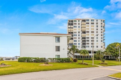 Live the Florida dream in your new move-in ready corner unit on Isla Del Sol Yacht and Country Club in Florida - for sale on GolfHomes.com, golf home, golf lot