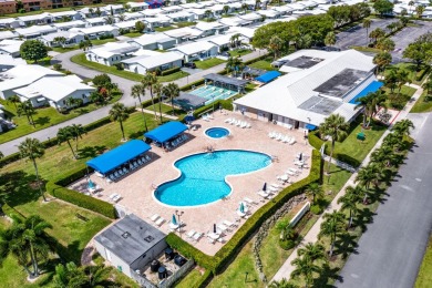 Edgewood Model- Featuring 2 spacious bedrooms, 2 modern on Leisureville Community Golf Course in Florida - for sale on GolfHomes.com, golf home, golf lot