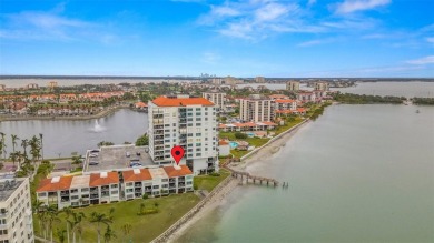 Live the Florida dream in your new move-in ready corner unit on Isla Del Sol Yacht and Country Club in Florida - for sale on GolfHomes.com, golf home, golf lot