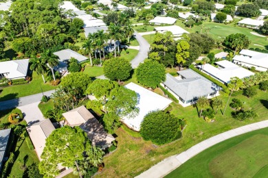 Inviting 3-Bedroom Home with Golf & Lake Views in beautiful on Quail Ridge Golf Course and Country Club in Florida - for sale on GolfHomes.com, golf home, golf lot