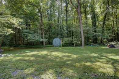 Discover your private retreat in this hidden gem, offering the on Emerald Lake Golf Club in North Carolina - for sale on GolfHomes.com, golf home, golf lot