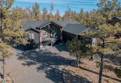 Nestled among the tall pines of the prestigious Torreon Golf on Torreon Golf Club in Arizona - for sale on GolfHomes.com, golf home, golf lot