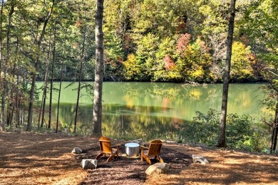 Overlooking a serene hidden lake--known by some residents as on White Path Golf Club in Georgia - for sale on GolfHomes.com, golf home, golf lot