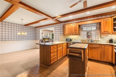 Welcome Home to this adorable home with a sweet cottage vibe on Carolina Trace Country Club in North Carolina - for sale on GolfHomes.com, golf home, golf lot
