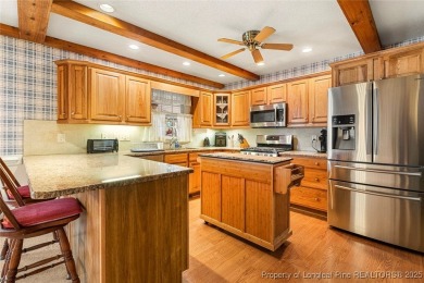 Welcome Home to this adorable home with a sweet cottage vibe on Carolina Trace Country Club in North Carolina - for sale on GolfHomes.com, golf home, golf lot
