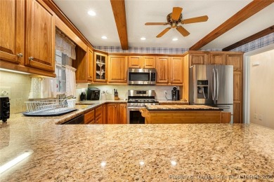 Welcome Home to this adorable home with a sweet cottage vibe on Carolina Trace Country Club in North Carolina - for sale on GolfHomes.com, golf home, golf lot