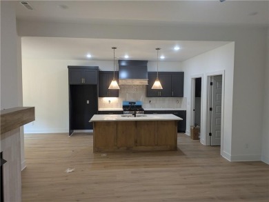 New construction on a large .36 acre wooded lot located near the on Bella Vista - Metfield Golf Complex and Country Club in Arkansas - for sale on GolfHomes.com, golf home, golf lot