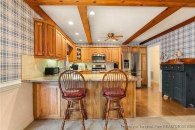Welcome Home to this adorable home with a sweet cottage vibe on Carolina Trace Country Club in North Carolina - for sale on GolfHomes.com, golf home, golf lot