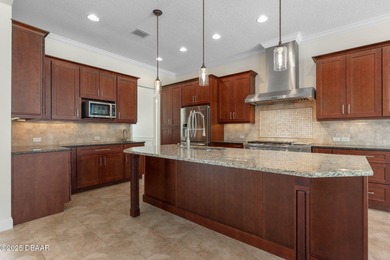 One or more photo(s) has been virtually staged. Nestled on a on The Ocean Course At Hammock Beach Resort in Florida - for sale on GolfHomes.com, golf home, golf lot