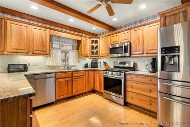 Welcome Home to this adorable home with a sweet cottage vibe on Carolina Trace Country Club in North Carolina - for sale on GolfHomes.com, golf home, golf lot