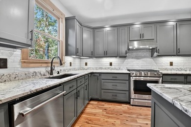 Overlooking a serene hidden lake--known by some residents as on White Path Golf Club in Georgia - for sale on GolfHomes.com, golf home, golf lot