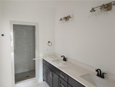 New construction on a large .36 acre wooded lot located near the on Bella Vista - Metfield Golf Complex and Country Club in Arkansas - for sale on GolfHomes.com, golf home, golf lot