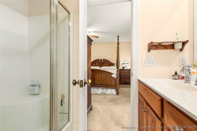 Welcome Home to this adorable home with a sweet cottage vibe on Carolina Trace Country Club in North Carolina - for sale on GolfHomes.com, golf home, golf lot