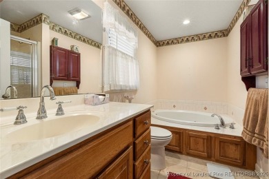Welcome Home to this adorable home with a sweet cottage vibe on Carolina Trace Country Club in North Carolina - for sale on GolfHomes.com, golf home, golf lot