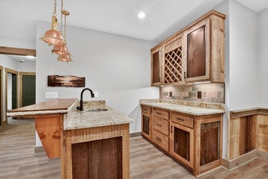 Overlooking a serene hidden lake--known by some residents as on White Path Golf Club in Georgia - for sale on GolfHomes.com, golf home, golf lot