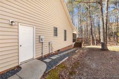 Welcome Home to this adorable home with a sweet cottage vibe on Carolina Trace Country Club in North Carolina - for sale on GolfHomes.com, golf home, golf lot