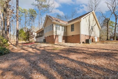 Welcome Home to this adorable home with a sweet cottage vibe on Carolina Trace Country Club in North Carolina - for sale on GolfHomes.com, golf home, golf lot
