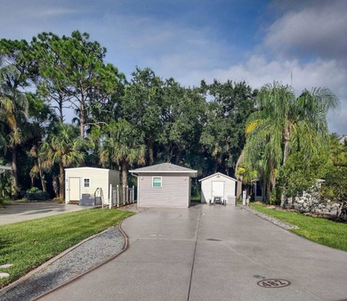This RV site features a 10'x12' storage/golf cart shed and a on The Great Outdoors Golf and Country Club in Florida - for sale on GolfHomes.com, golf home, golf lot