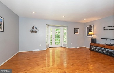 This spacious 3-level townhome is nestled in the sought-after on Bay Hills Golf Club in Maryland - for sale on GolfHomes.com, golf home, golf lot