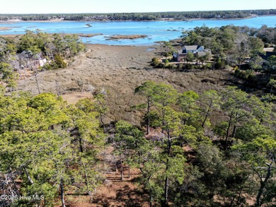Set on more than half an acre, this surveyed and partially on Lockwood Folly Country Club in North Carolina - for sale on GolfHomes.com, golf home, golf lot