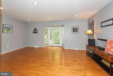 This spacious 3-level townhome is nestled in the sought-after on Bay Hills Golf Club in Maryland - for sale on GolfHomes.com, golf home, golf lot