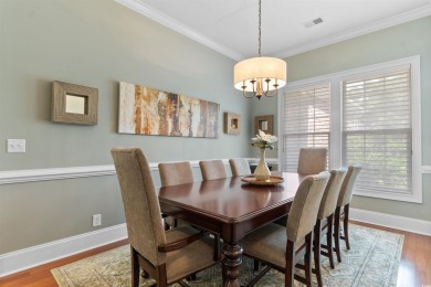 This gorgeous brick residence in sought-after Pawleys Island, SC on Pawleys Plantation Golf and Country Club in South Carolina - for sale on GolfHomes.com, golf home, golf lot