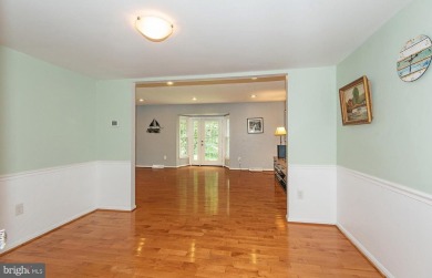 This spacious 3-level townhome is nestled in the sought-after on Bay Hills Golf Club in Maryland - for sale on GolfHomes.com, golf home, golf lot