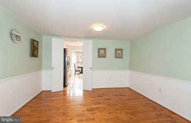 This spacious 3-level townhome is nestled in the sought-after on Bay Hills Golf Club in Maryland - for sale on GolfHomes.com, golf home, golf lot