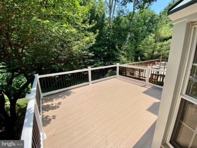 This spacious 3-level townhome is nestled in the sought-after on Bay Hills Golf Club in Maryland - for sale on GolfHomes.com, golf home, golf lot