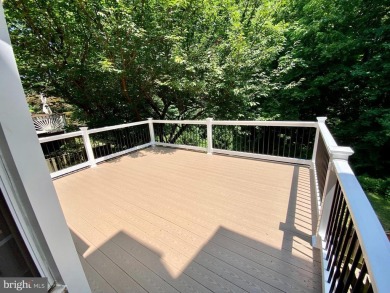 This spacious 3-level townhome is nestled in the sought-after on Bay Hills Golf Club in Maryland - for sale on GolfHomes.com, golf home, golf lot