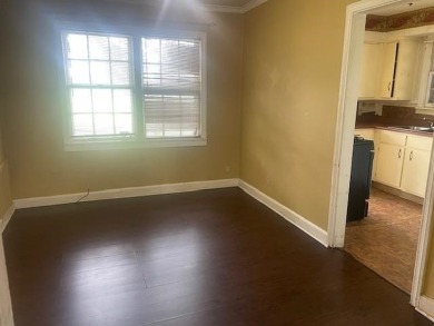 Charming 2-bedroom, 1-bath home with direct backyard access to on Pine Hill Golf Course in Tennessee - for sale on GolfHomes.com, golf home, golf lot