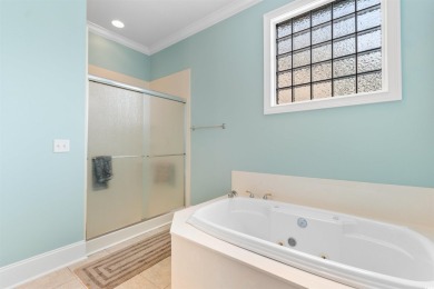 This gorgeous brick residence in sought-after Pawleys Island, SC on Pawleys Plantation Golf and Country Club in South Carolina - for sale on GolfHomes.com, golf home, golf lot