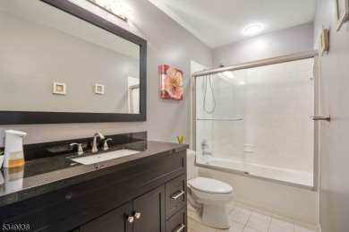 Welcome to this stunning renovated three-level end unit on New Jersey National Golf Club in New Jersey - for sale on GolfHomes.com, golf home, golf lot