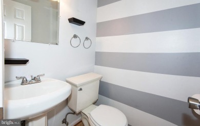 This spacious 3-level townhome is nestled in the sought-after on Bay Hills Golf Club in Maryland - for sale on GolfHomes.com, golf home, golf lot