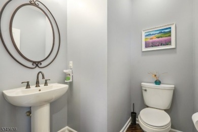 Welcome to this stunning renovated three-level end unit on New Jersey National Golf Club in New Jersey - for sale on GolfHomes.com, golf home, golf lot