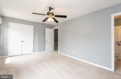 This spacious 3-level townhome is nestled in the sought-after on Bay Hills Golf Club in Maryland - for sale on GolfHomes.com, golf home, golf lot