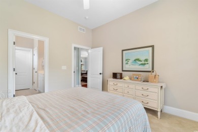 This gorgeous brick residence in sought-after Pawleys Island, SC on Pawleys Plantation Golf and Country Club in South Carolina - for sale on GolfHomes.com, golf home, golf lot