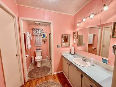 Home is located in Water Oak Country Club Estates, an active 55 on Water Oak Country Club Estates in Florida - for sale on GolfHomes.com, golf home, golf lot