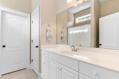 This gorgeous brick residence in sought-after Pawleys Island, SC on Pawleys Plantation Golf and Country Club in South Carolina - for sale on GolfHomes.com, golf home, golf lot