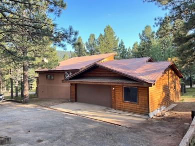 Beautiful getaway in Angel Fire only 1.7 mi from the ski base on Angel Fire Resort Country Club in New Mexico - for sale on GolfHomes.com, golf home, golf lot