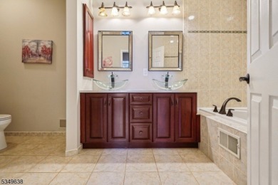 Welcome to this stunning renovated three-level end unit on New Jersey National Golf Club in New Jersey - for sale on GolfHomes.com, golf home, golf lot