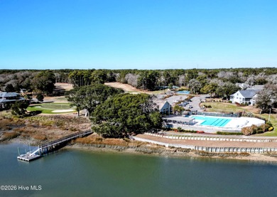 Set on more than half an acre, this surveyed and partially on Lockwood Folly Country Club in North Carolina - for sale on GolfHomes.com, golf home, golf lot
