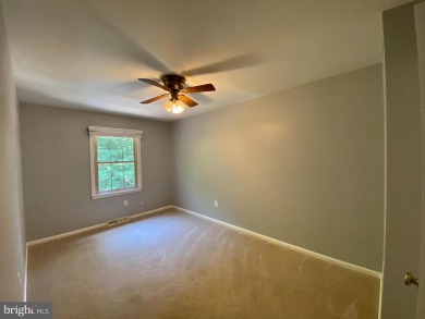 This spacious 3-level townhome is nestled in the sought-after on Bay Hills Golf Club in Maryland - for sale on GolfHomes.com, golf home, golf lot